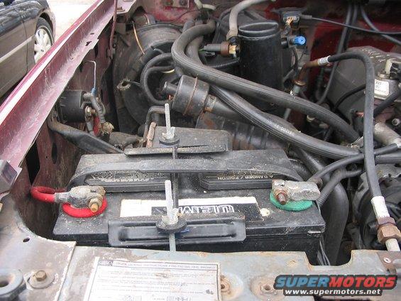 107_0722.jpg new tie downs for the battery
