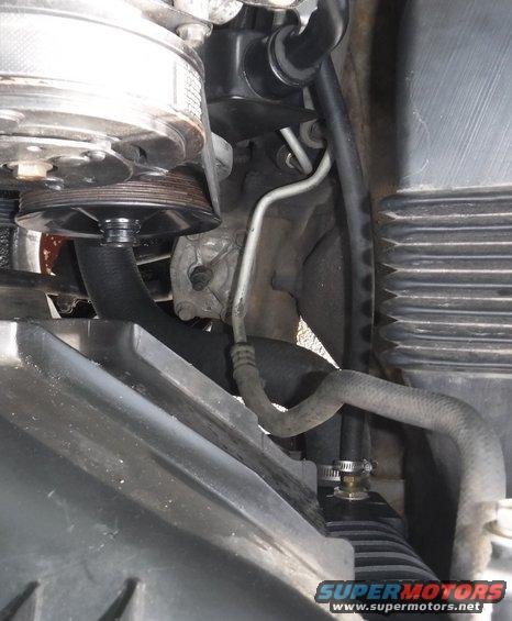 dscf1482--tight-ps-return-routing-(radiator-cooler)-with-offset-saginaw.jpg With the offset Saginaw reservoir, the return hose from the radiator's tranny cooler (I used it for the PS cooler, since I added an external transmission cooler) is a bit tougher to access (hasn't been cut shorter and hooked up to the pump in the picture).  The lines to the steering box are also tougher to get to.