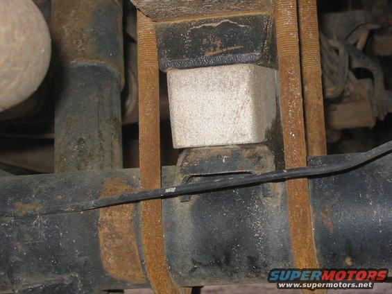 107_0740.jpg two inch riser block on the rear suspension