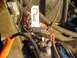 1978 Ford Bronco - A close-up view of a vehicle's engine bay, various wires and a prominent question mark tag.