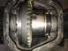 1989 Ford Bronco - Close-up view of a differential gear assembly, showing internal components and some part numbers.