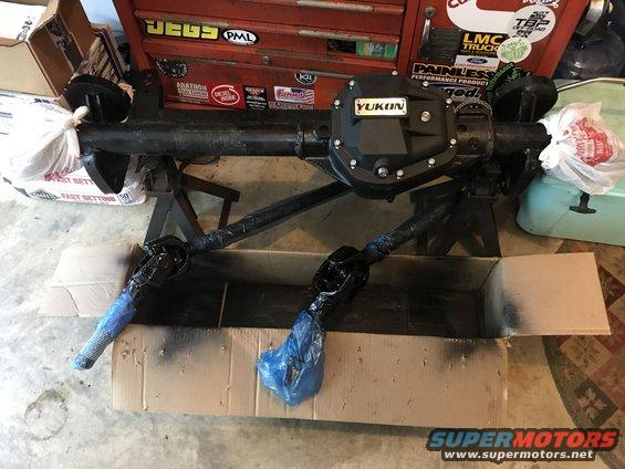 Yukon differential axle assembly on jack stands, with driveshafts covered