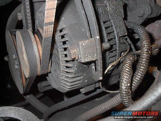 picture-061.jpg 3G 1995 Mustang 130 amp alternator with 4 gauge wire right off stud direct to Little 175 amp Mega Fuse distribution block. Note small white wire with tracer.