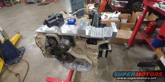 20191115 - Engine still coming together. High mount AC brackets are installed with the 45 degree lower water neck. This is needed to work well with the 7.3l radiator.