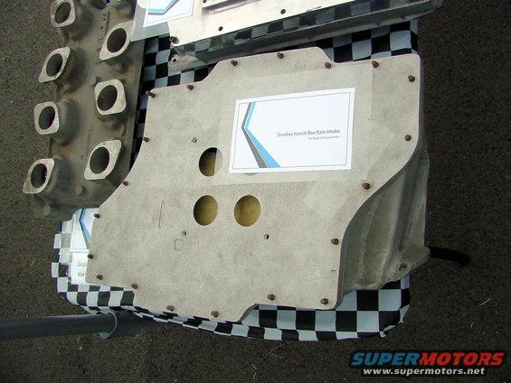 Aluminum engine intake manifold with a label reading "Smokey Yunick Box Ram Intake"