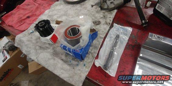 20191118_165316.jpg 20191118 - New fan/idle bearing, M10 1.5thread pitch by 140 mm long bolt as there was one missing for the lower water neck, and 8 rib pulley needed for the alternator (Part#f65z10344aa, Motorcraft GP720). 
