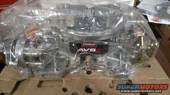 Edelbrock AVS2 carburetor in plastic packaging on cardboard