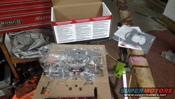 New chrome carburetor and gaskets in packaging