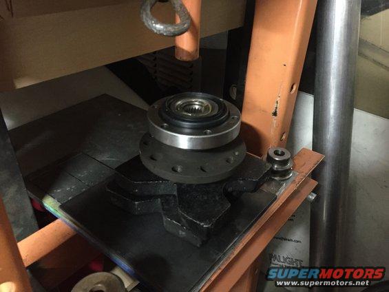 Flange and bearing assembly on press