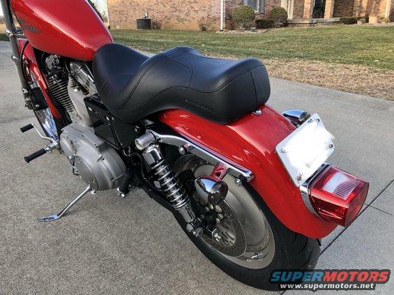 Red 2002 Harley-Davidson Sportster Custom motorcycle rear view