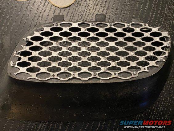 Custom grille insert with hexagonal mesh pattern