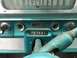 1960 Ford Starliner - The interior of a 1960 Ford Starliner features a turquoise dashboard with a speedometer and a PRND2L gear selector.