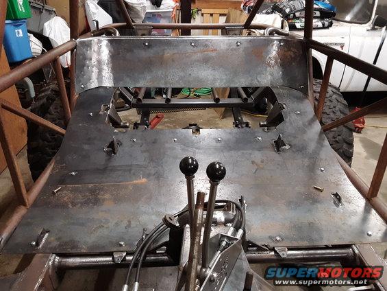Custom buggy interior with dual shifters and unfinished metal floor