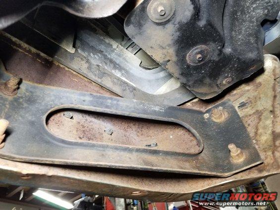 The front bumper corner braces are intact, and the trim is original.