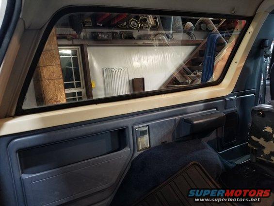 The cargo carpet is replacement, but made fairly well. It was cut instead of being installed under the seat brackets; and the wheelwell carpets are reversed.