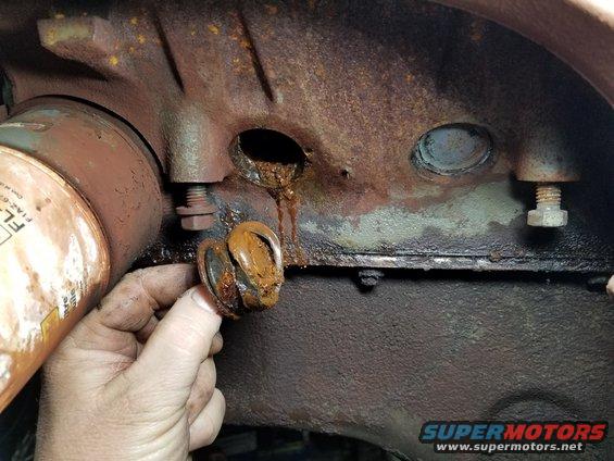 Left front rubber plug not fully installed