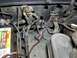 1996 Ford Bronco - Amp wire passes through jack & lug wrench storage area