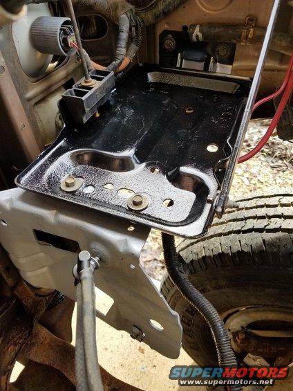 20200116_110548.jpg While the engine was out of the way, I sandblasted & painted the battery tray, and galvanized its support.