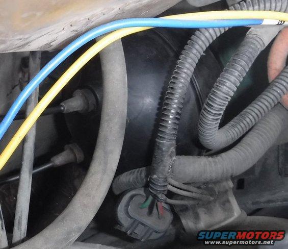 '80s F-series vacuum reservoir tucks in perfectly below the coolant/washer reservoirs and headlight.