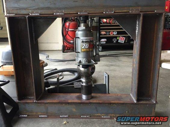 Hydraulic press frame with a 20-ton bottle jack in the center