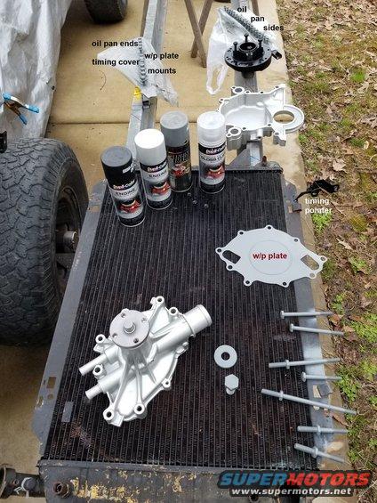 After a lot of parts-washing & sandblasting, I painted all the timing cover parts.