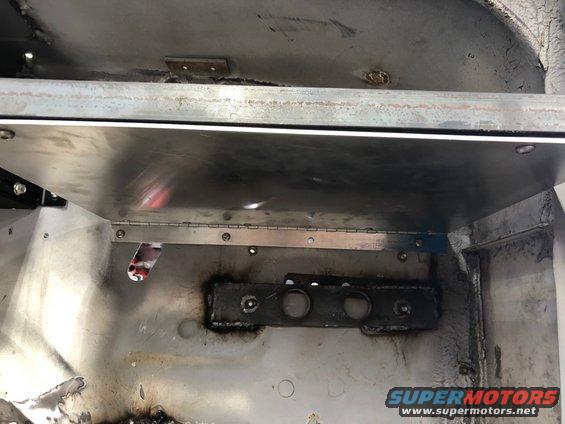 Interior metal paneling with hinges and brackets