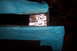1995 Ford Bronco - A close-up view shows a metal bracket that has been welded and is partially covered with blue tape.