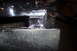 1995 Ford Bronco - Detail of a patch weld on a vehicle's frame, showing metal repair work.