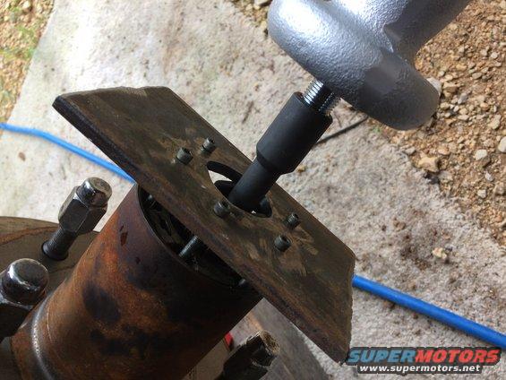 slide hammer and plate to remove stuck warn locking hub