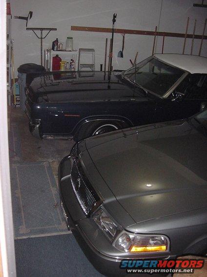 dual-m-001.jpg Good thing this garage is pretty generous, to be able to fit TWO Mercury Marquise.  One a huge 1969  convertible, and the other a 2003 Grand Marquis LSE!
