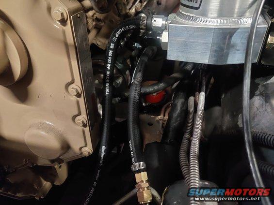 20200320 - Power steering lines are plumbed in and completed. Auxiliary port is capped as shown at the top of the photo.