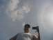 2002 Ford Taurus - Man takes a selfie in the reflection of a surface, capturing the sky and clouds.