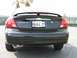 2002 Ford Taurus - Rear view of a black 2002 Ford Taurus SEL sedan with a spoiler and custom license plate.