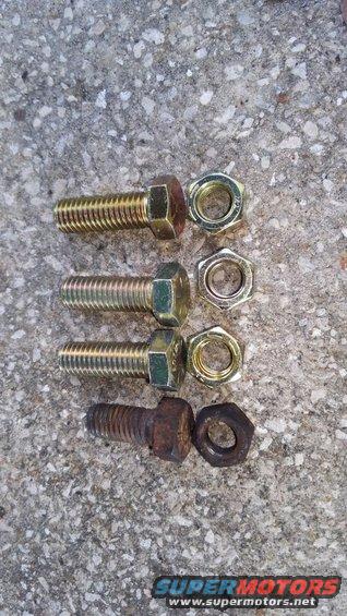 kimg0317.jpg the stock bolts were too short for use with the shim. i picked up (6) 1-1/2&quot; long 1/2&quot; bolts. 3 per side are used on the backing plate.

the stock nuts are stover style lock nuts to prevent loosening over time. they did not have any locknuts available where i bought the bolts so i used normal nuts with loctite to prevent loosening