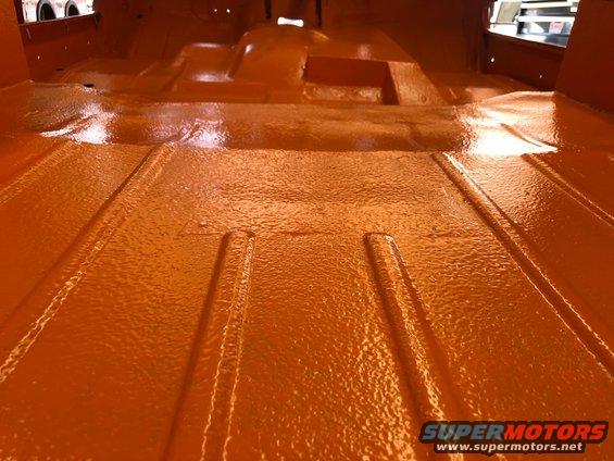 Orange painted interior floor of a vehicle