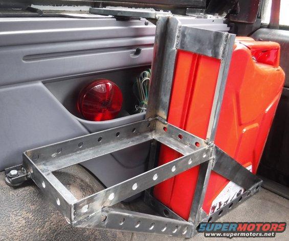 dscf1992--jerry-can-carrier.jpg Bed rail mount added for 3 anchor points.
