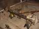 1992 Ford Bronco - A differential axle assembly is supported by jack stands in a workshop environment.