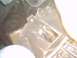 1991 Ford Crown Victoria - A close-up view of an engine part, possibly related to the oil pan or a similar component.