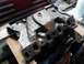 1978 Ford Bronco - Close-up of an engine intake manifold, likely for a classic vehicle.