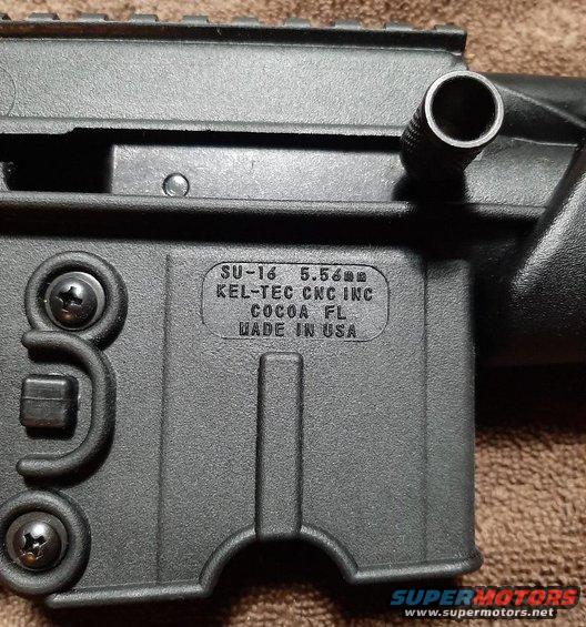Close-up of Kel-Tec SU-16 firearm receiver with text