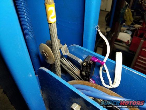 20200516_171820.jpg To make the LEDs automatic, I wired them to this paddle switch. When I lower the lift onto the locks, the cable goes slack, allowing the springs to pull the 2ndry locks in, which operates the switch to turn the lights on.