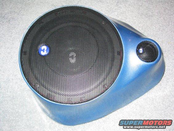 Blue speaker enclosure with mesh grille and '3' emblem