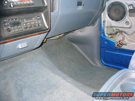 1989 Ford Bronco interior showing dashboard, radio, and door panel