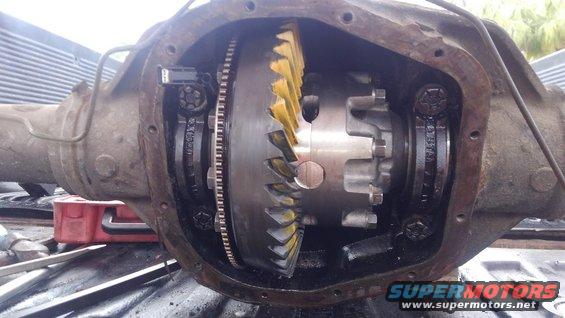 this is the new Ford e-locker used in 2011  10.5" Sterling axles. part number is BC3Z-4026-B and can be had around $500 if you know where to look. 

it is installed with 5.13 Dana SVL gears and a Yukon crush sleeve eliminator

i will drill a small hole in the case for the wiring and then RTV the hole up to prevent leaks.

the tone ring for the VSS will fit on the 10.5" e-locker but there is no cutout for the notch. either need a notch ground into the carrier or the tab of the tone ring needs to be ground off. it is press fit so i choose to grind tab off