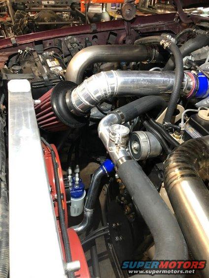 20200529 - Intake is additionally mounted to the AC bracket from DCS. The bracket was drilled and tapped and the intake bolted to it. Aluminum upper and lower lines were welded up for the cooling as well with a fill neck and a drain plug respectively. Ready for road testing!