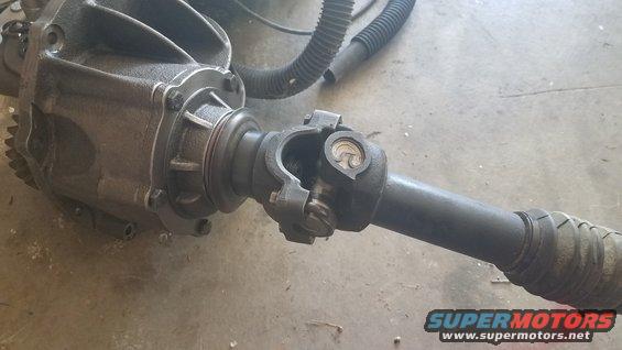 Differential and driveshaft assembly on concrete floor