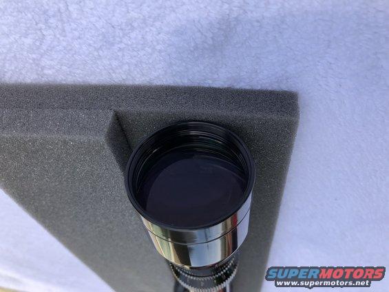 Telescope lens with Supermotors.net watermark