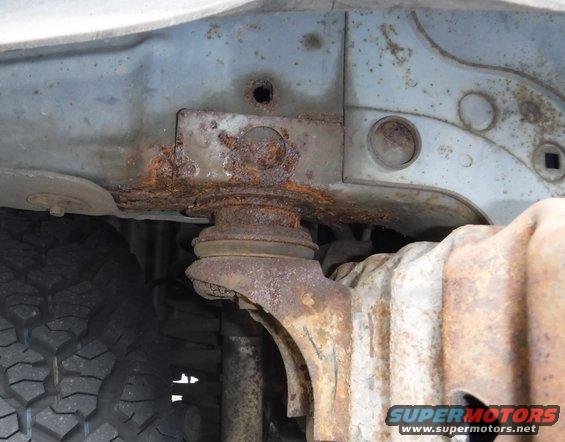 Front right body mount rust, but no rust to speak of anywhere else ... due to battery corrosion, maybe?