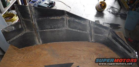 Backside view of the bumper wing.  The pool of weld material at the far left was added to level that better relative to the winch tray's top tab.
