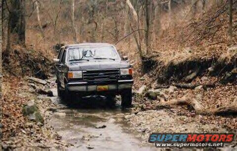 1989 Ford Bronco front view driving off-road